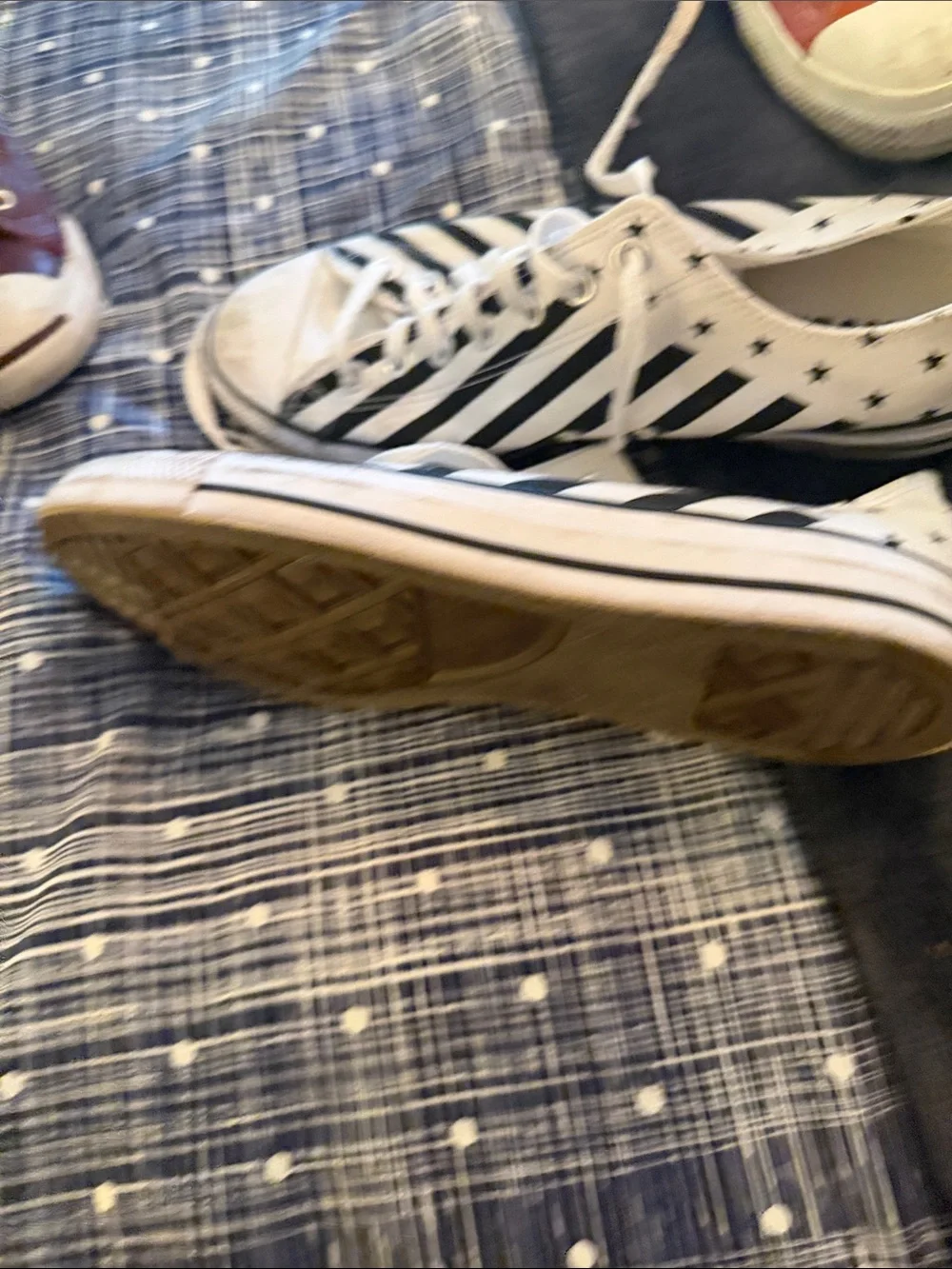 Converse White Canvas Sneakers with Black Diagonal Stripes and Star Accents
